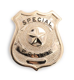 Photo of One badge on white background, top view. Police equipment