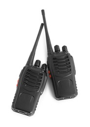 Photo of Two walkie talkies on white background, top view. Police equipment