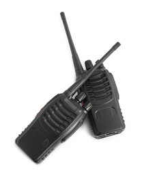 Photo of Two walkie talkies on white background, top view. Police equipment