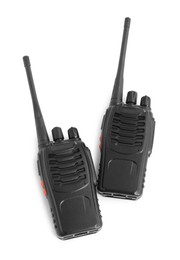 Photo of Two walkie talkies on white background, top view. Police equipment