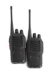 Photo of Two walkie talkies on white background, top view. Police equipment