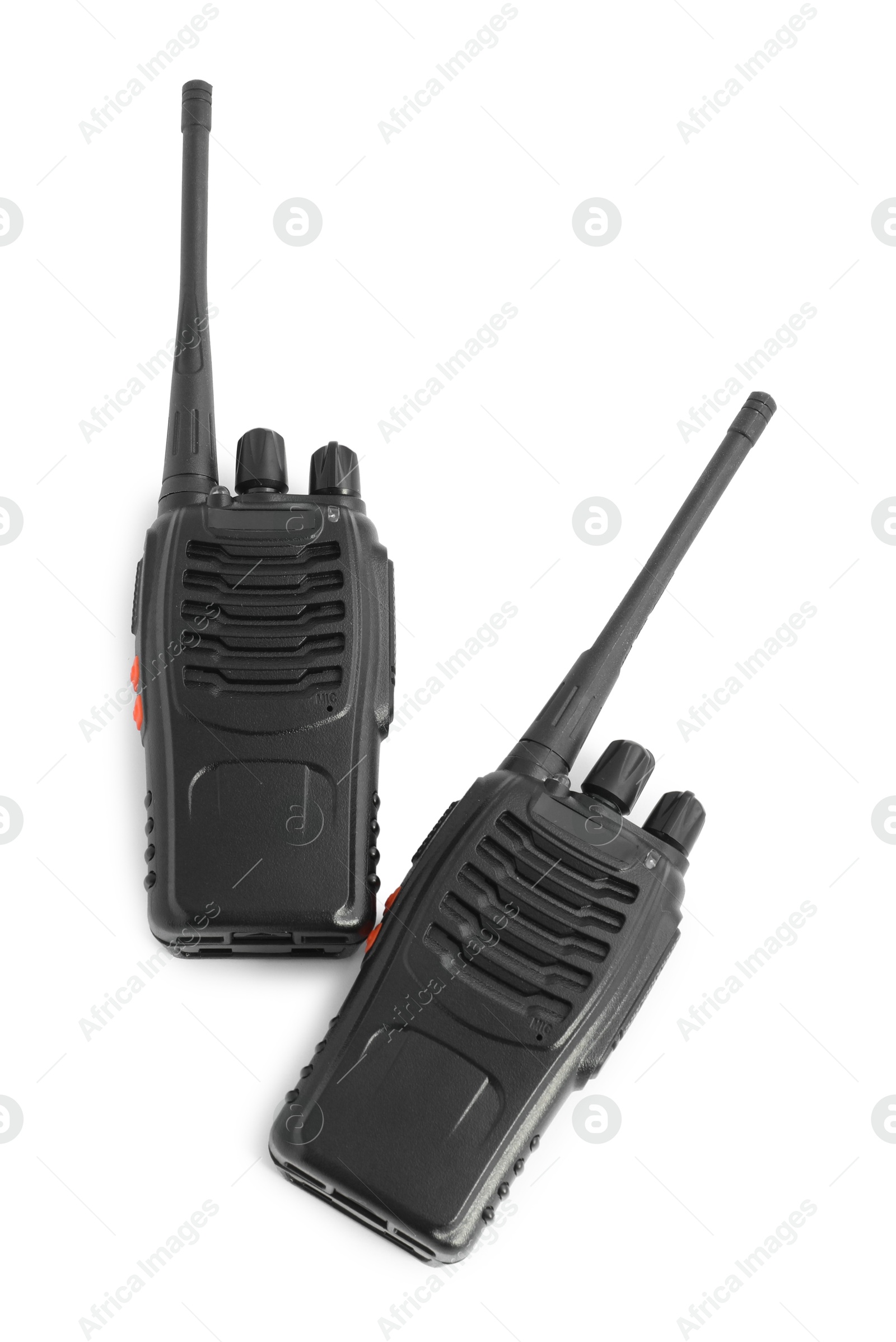 Two walkie talkies on white background, top view. Police equipment Photo of Two walkie talkies on white background, top view. Police equipment