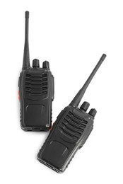 Photo of Two walkie talkies on white background, top view. Police equipment