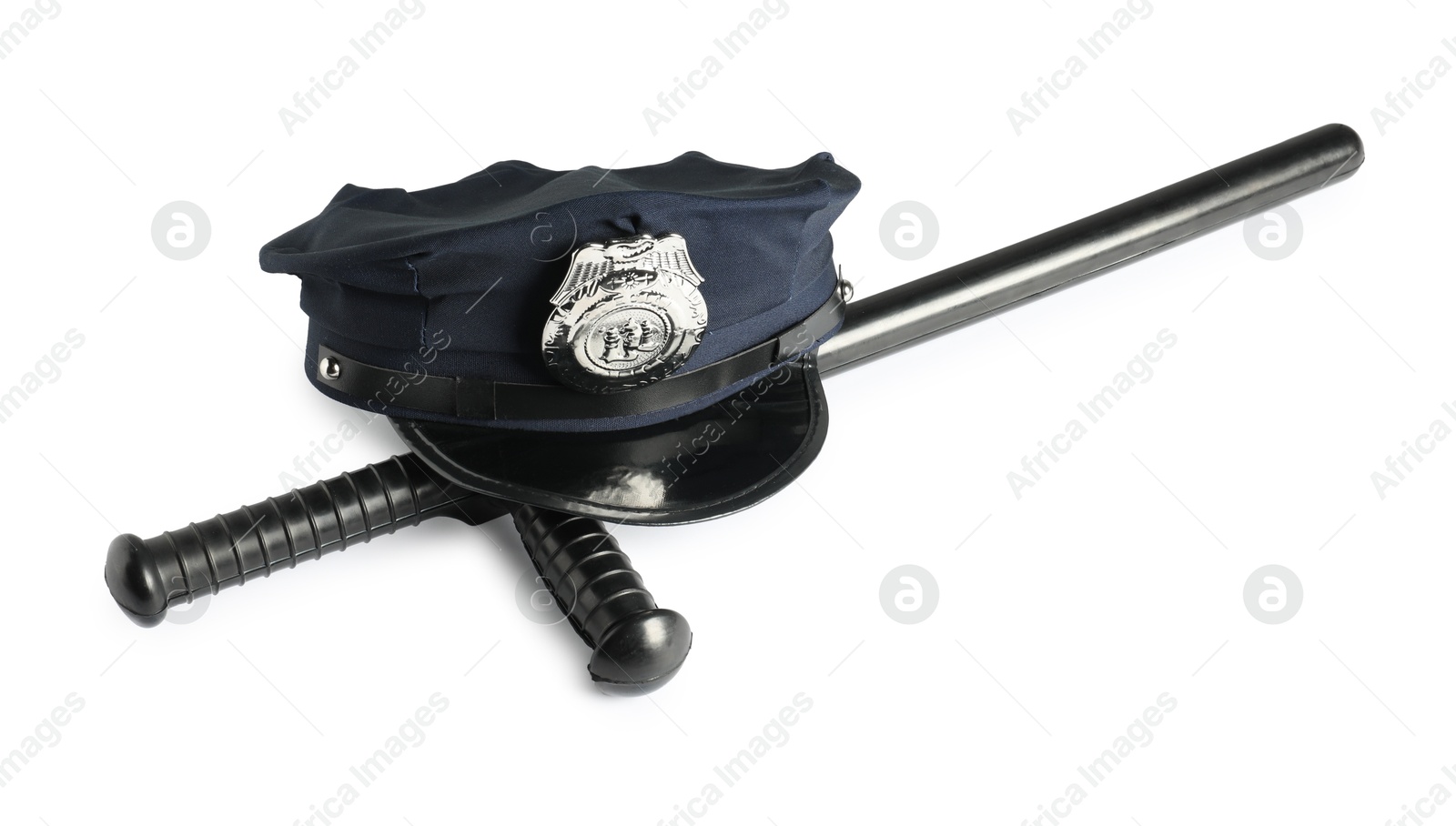 Police cap and baton on white background Photo of Police cap and baton on white background