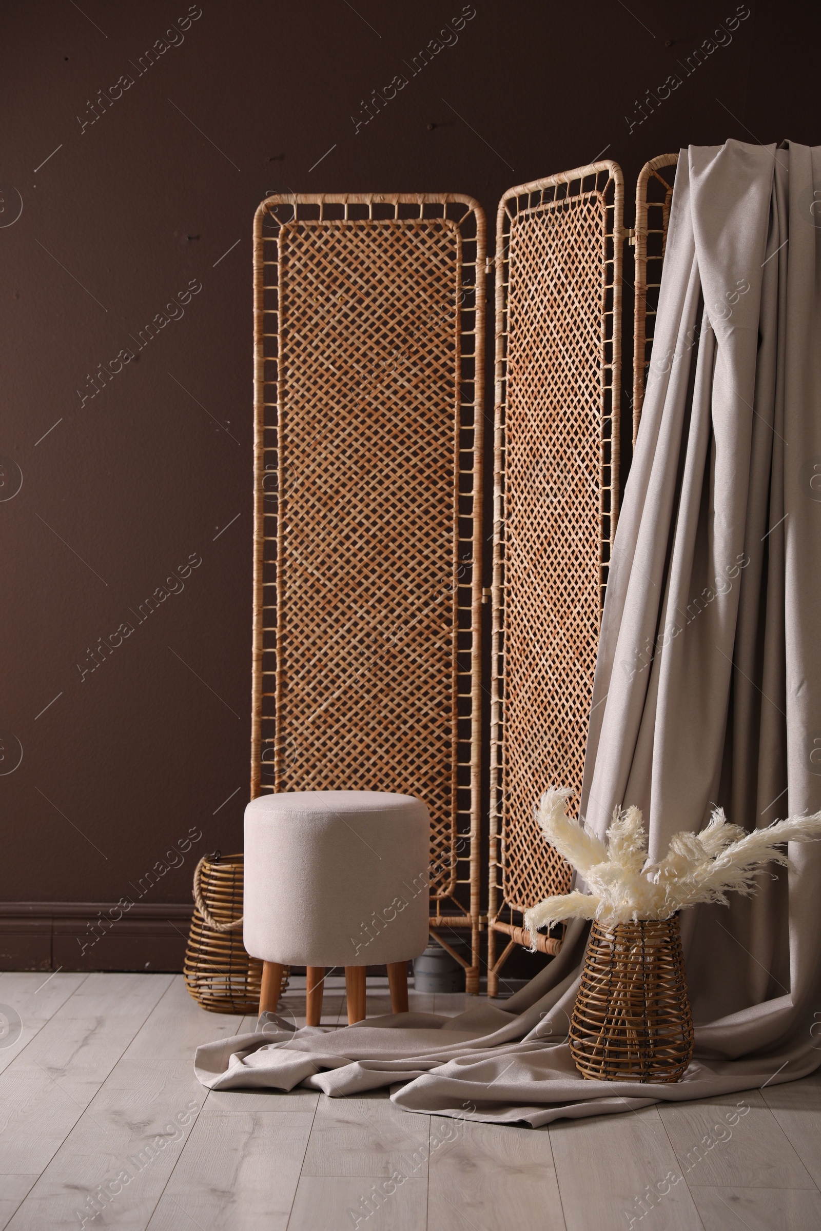 Photo zone with stylish folding screen in studio Photo of Photo zone with stylish folding screen in studio