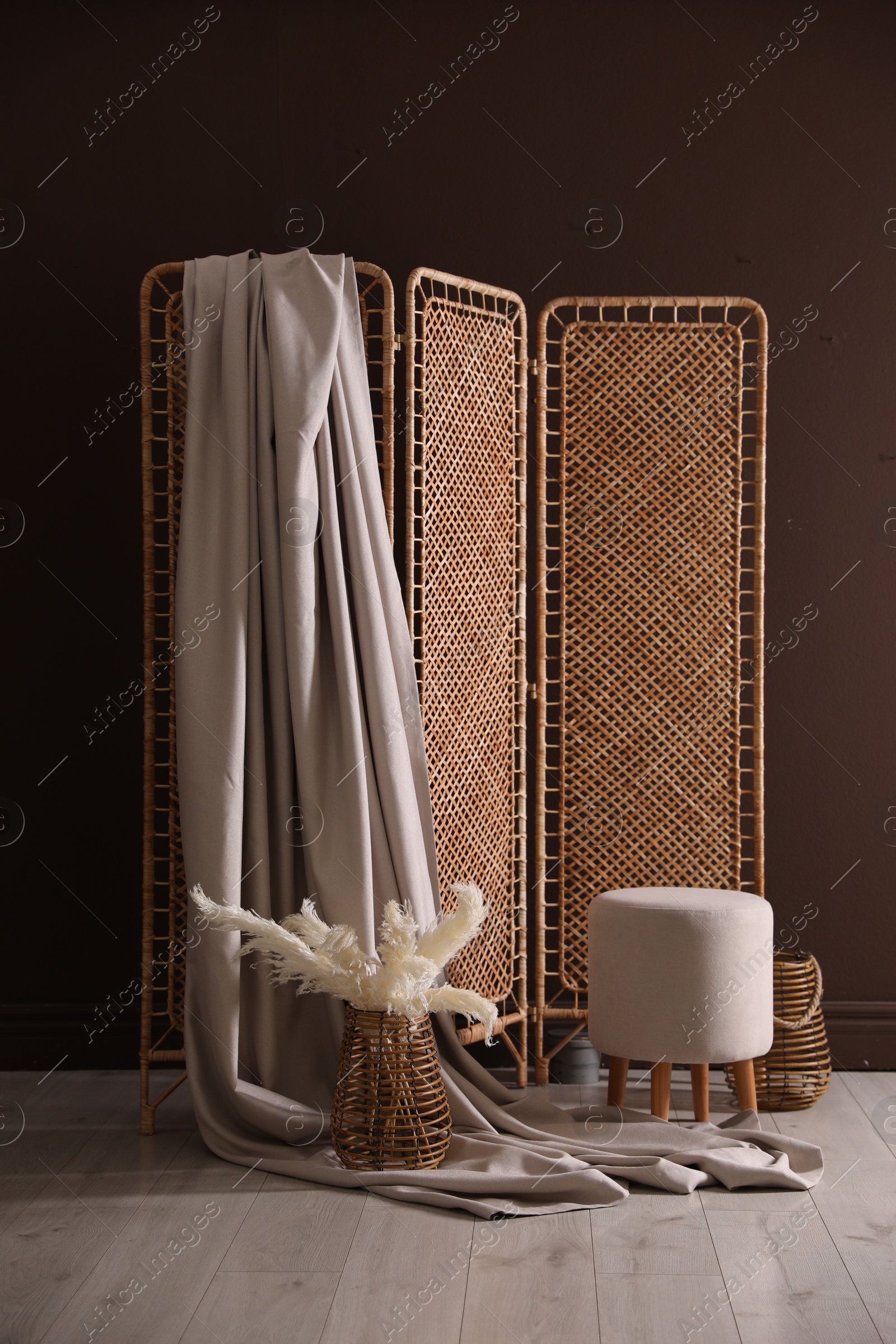 Photo zone with stylish folding screen in studio Photo of Photo zone with stylish folding screen in studio