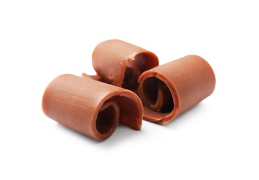 Photo of Tasty chocolate butter shavings isolated on white