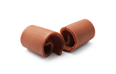 Photo of Tasty chocolate butter shavings isolated on white