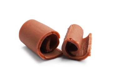 Photo of Tasty chocolate butter shavings isolated on white