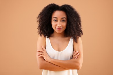 Photo of Portrait of beautiful Brazilian woman on beige background