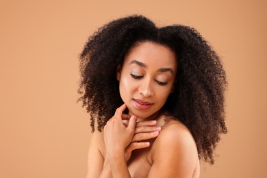 Photo of Portrait of beautiful Brazilian woman on beige background