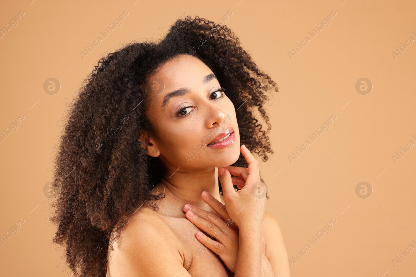 Portrait of beautiful Brazilian woman on beige background. Space for text Photo of Portrait of beautiful Brazilian woman on beige background. Space for text
