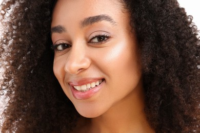 Photo of Portrait of beautiful Brazilian woman on white background, closeup