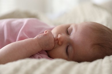 Photo of Cute newborn baby sleeping on bed indoors