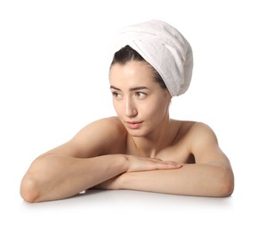 Photo of Beautiful woman after spa treatment at mirror surface on white background