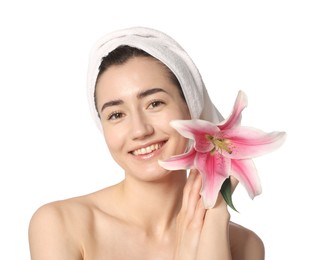 Photo of Portrait of smiling woman with lily flower after spa treatment on white background, closeup