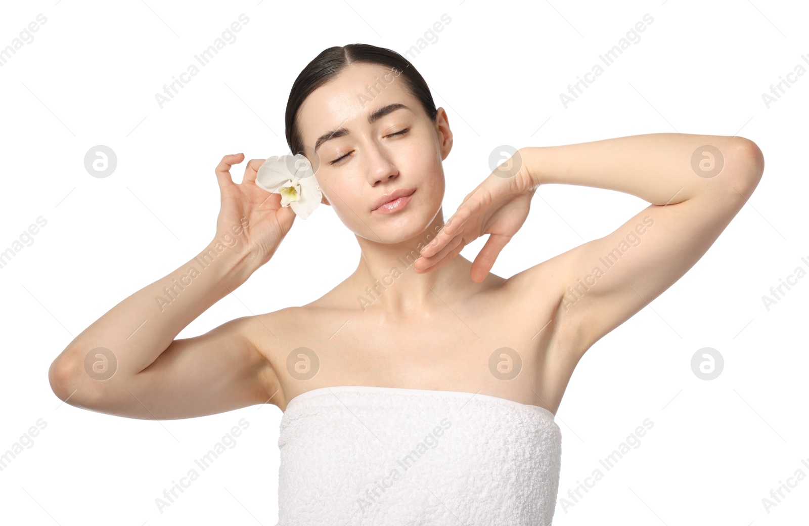 Portrait of beautiful woman with orchid flower after spa treatment on white background Photo of Portrait of beautiful woman with orchid flower after spa treatment on white background