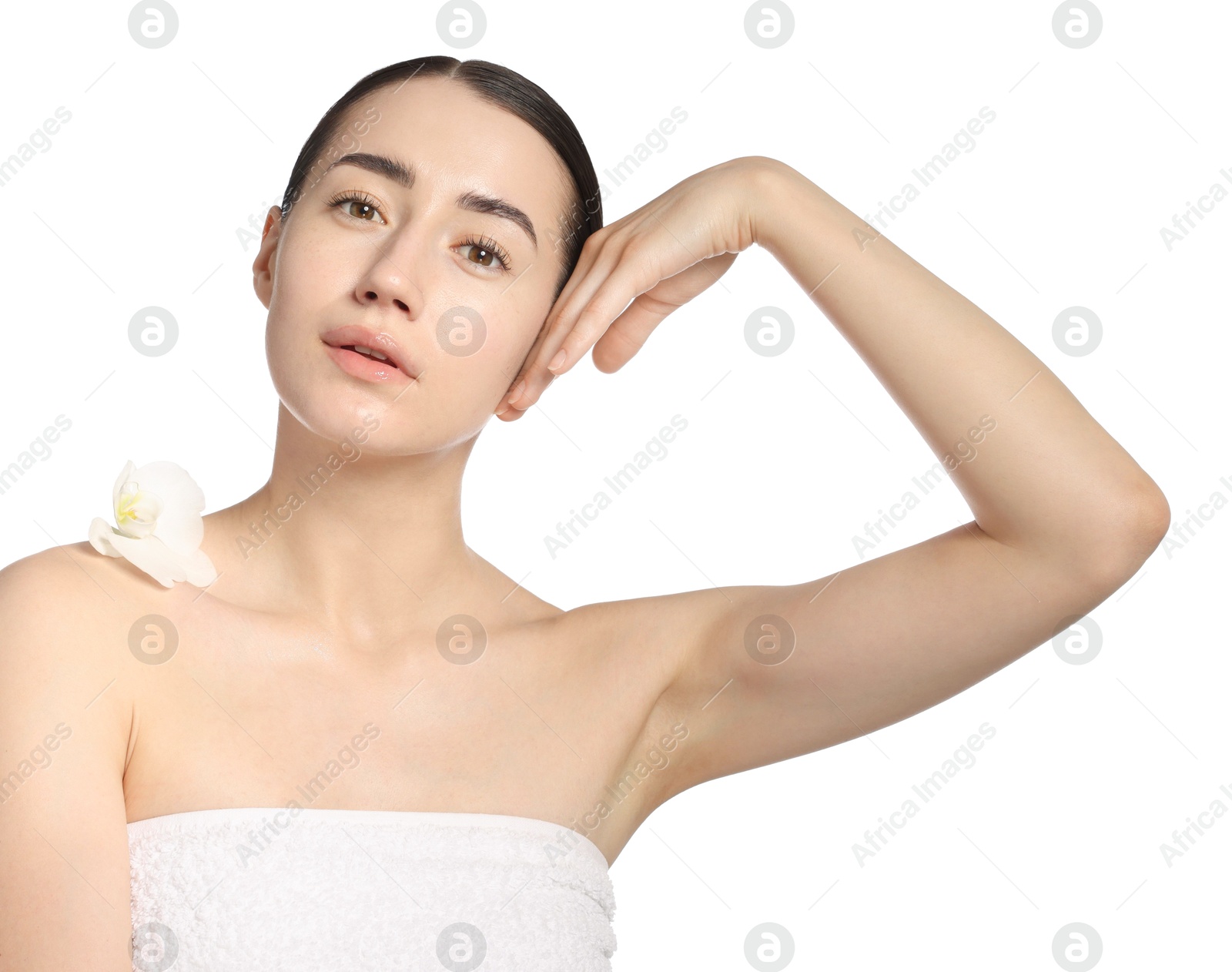 Portrait of beautiful woman with orchid flower after spa treatment on white background Photo of Portrait of beautiful woman with orchid flower after spa treatment on white background