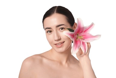 Photo of Portrait of smiling woman with lily flower after spa treatment on white background, closeup