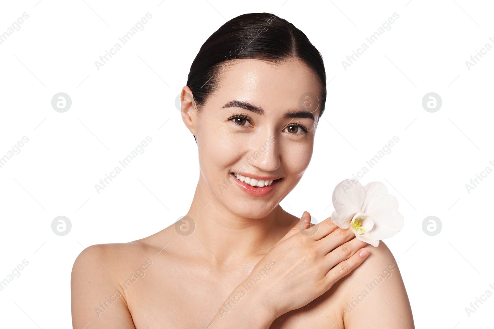 Portrait of smiling woman with orchid flower after spa treatment on white background, closeup Photo of Portrait of smiling woman with orchid flower after spa treatment on white background, closeup