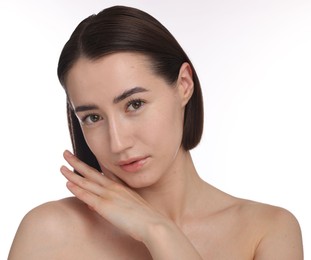 Photo of Portrait of beautiful woman after spa treatment on white background, closeup