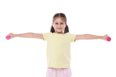 Photo of Little girl with dumbbells on white background