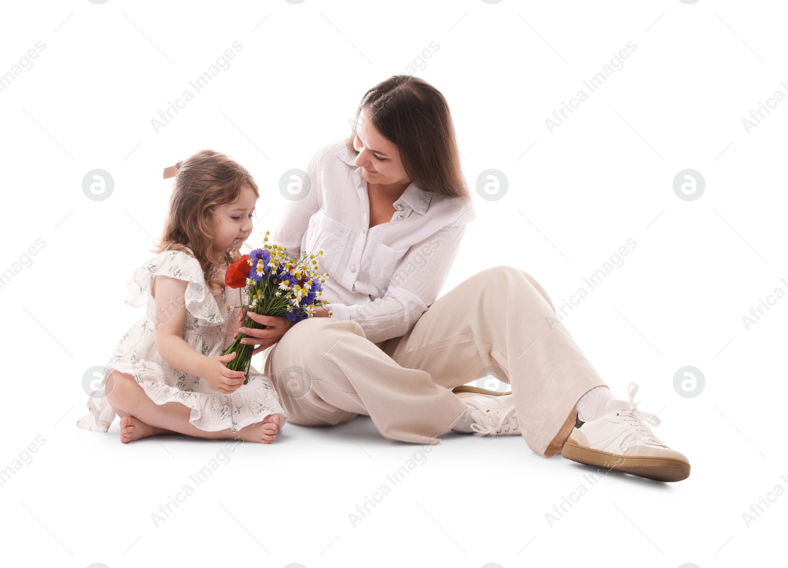 Mother and her little daughter with bouquet of beautiful flowers on white background Photo of Mother and her little daughter with bouquet of beautiful flowers on white background