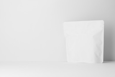 Photo of Zipper stand-up pouch on white background. Mockup for design