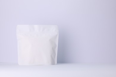 Photo of Zipper stand-up pouch on white background. Mockup for design