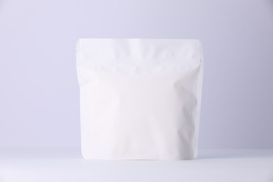 Photo of Zipper stand-up pouch on white background. Mockup for design
