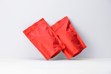 Photo of Zipper stand-up pouches on white background. Mockup for design