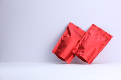 Photo of Zipper stand-up pouches on white background. Mockup for design