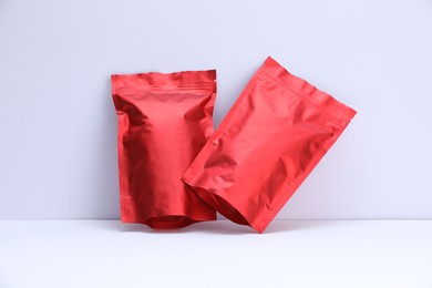 Photo of Zipper stand-up pouches on white background. Mockup for design