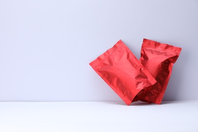 Photo of Zipper stand-up pouches on white background. Mockup for design