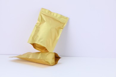 Photo of Zipper stand-up pouches on white background. Mockup for design