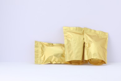 Photo of Zipper stand-up pouches on white background. Mockup for design