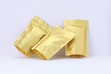 Photo of Zipper stand-up pouches on white background. Mockup for design