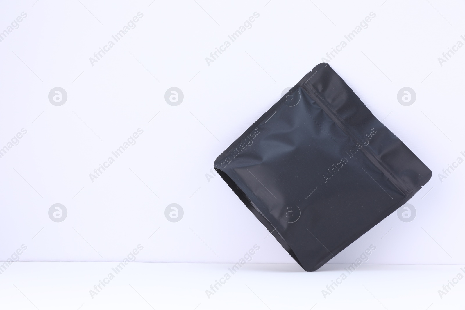 Zipper stand-up pouch on white background. Mockup for design Photo of Zipper stand-up pouch on white background. Mockup for design