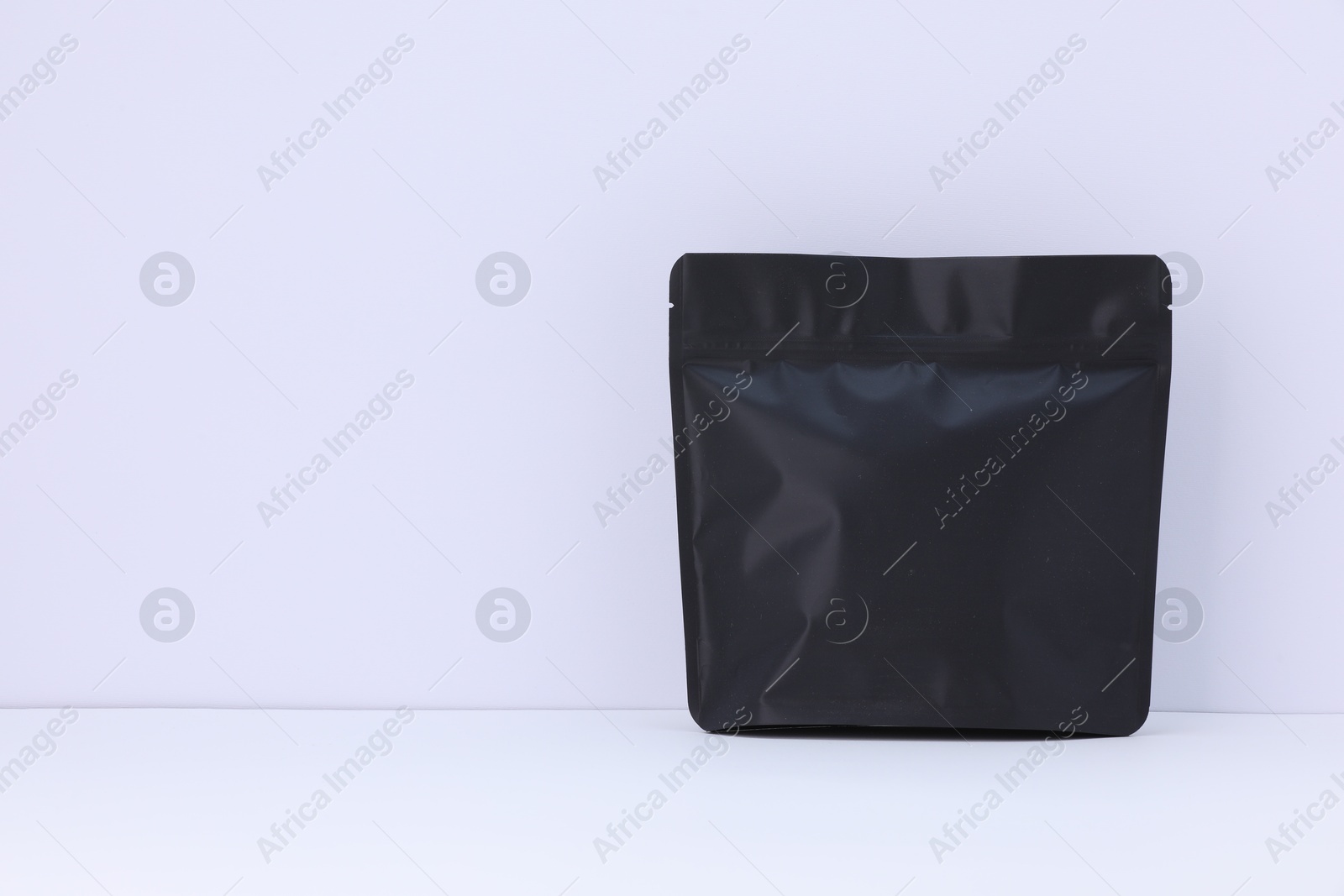 Zipper stand-up pouch on white background. Mockup for design Photo of Zipper stand-up pouch on white background. Mockup for design