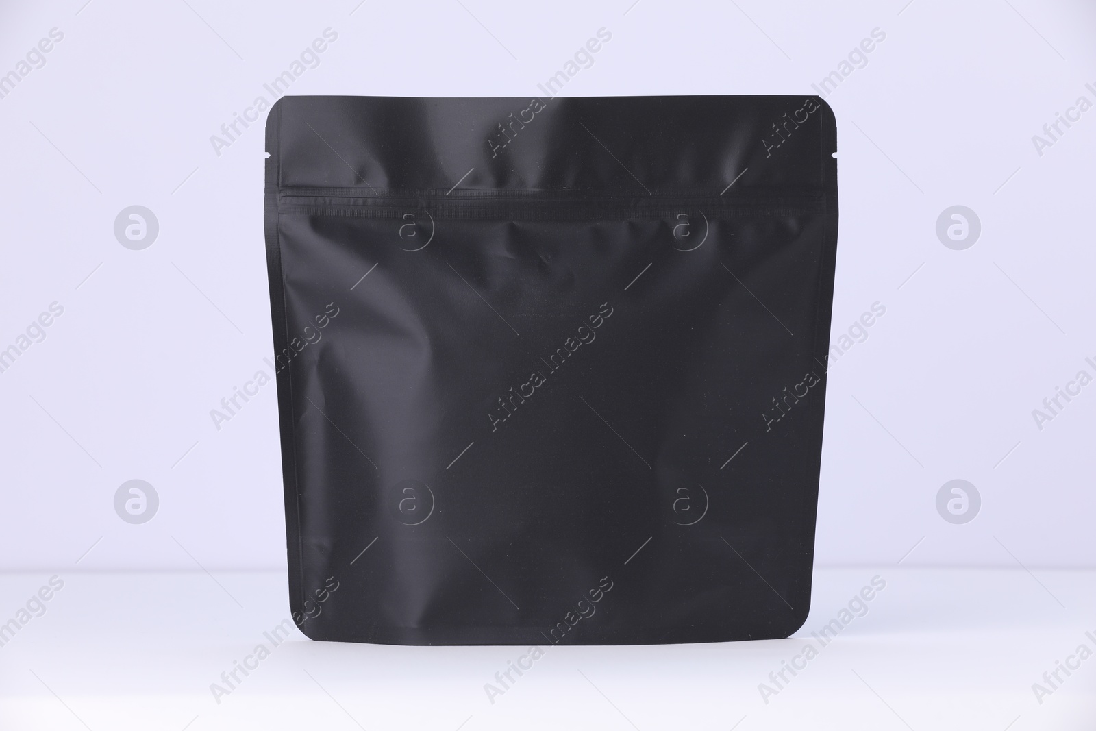 Zipper stand-up pouch on white background. Mockup for design Photo of Zipper stand-up pouch on white background. Mockup for design