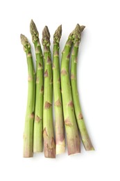 Photo of Fresh raw asparagus spears isolated on white, top view