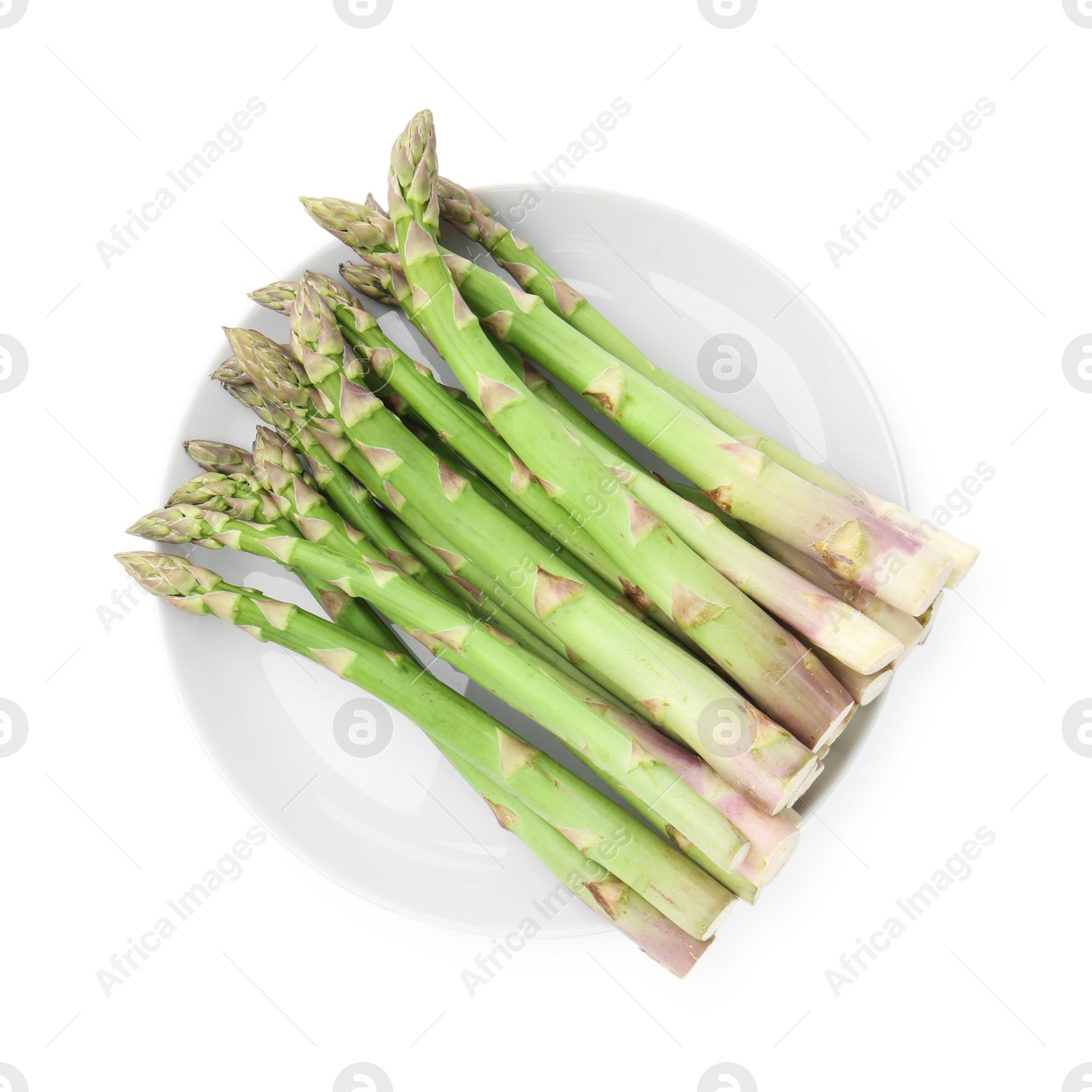 Fresh raw asparagus spears isolated on white, top view Photo of Fresh raw asparagus spears isolated on white, top view