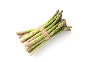 Photo of Bunch of fresh raw asparagus spears isolated on white, top view