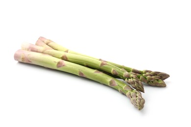 Photo of Fresh raw asparagus spears isolated on white