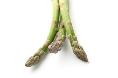 Photo of Fresh raw asparagus spears isolated on white
