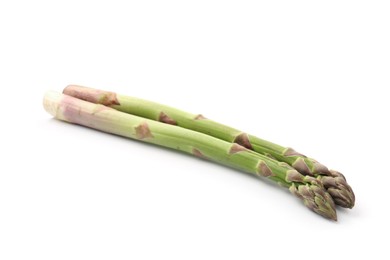 Photo of Fresh raw asparagus spears isolated on white