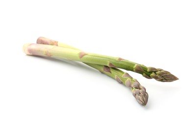 Photo of Fresh raw asparagus spears isolated on white