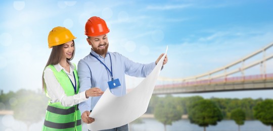 Image of Construction engineers with draft against bridge outdoors. Banner design