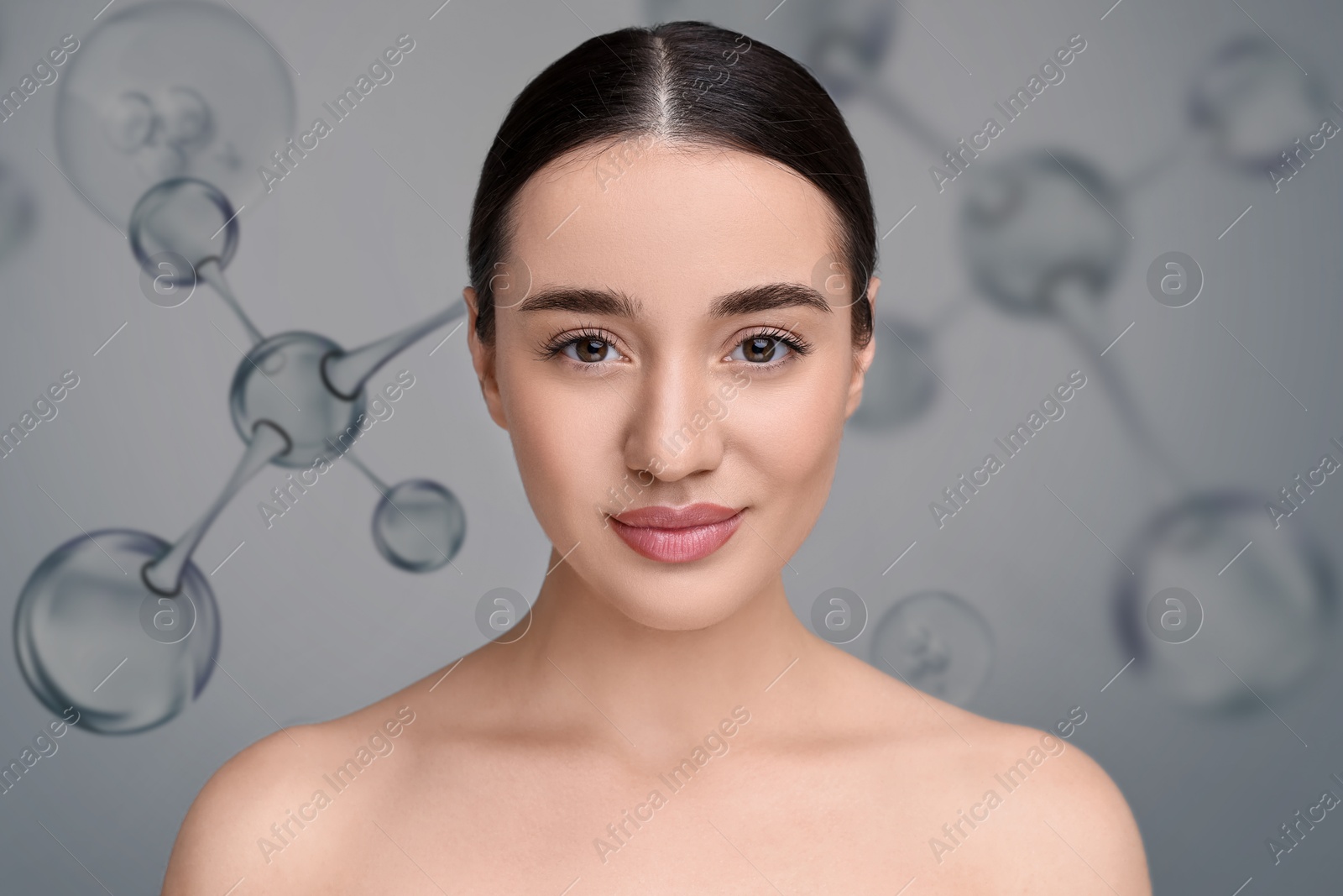 Beautiful woman and collagen molecules on grey background Image of Beautiful woman and collagen molecules on grey background