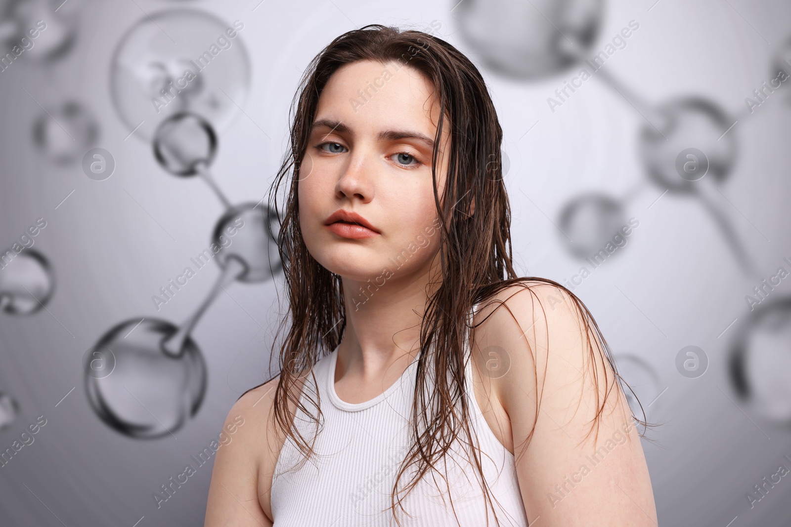 Beautiful woman and collagen molecules on grey background Image of Beautiful woman and collagen molecules on grey background